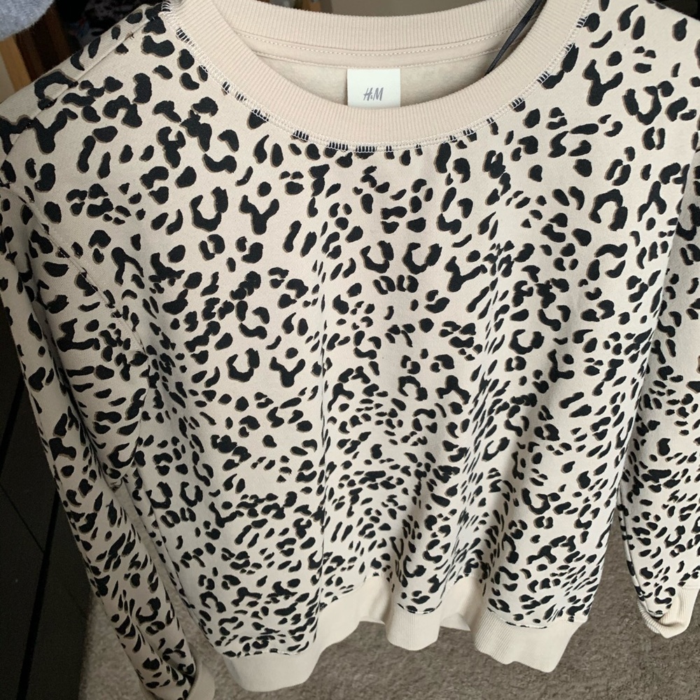 Cheetah Crew neck sweatshirt.